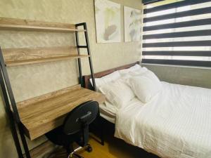 Ein Etagenbett oder Etagenbetten in einem Zimmer der Unterkunft 3BR Beach House San Juan Batangas