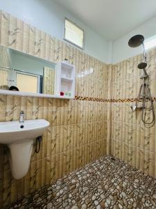 a bathroom with a sink and a shower at AJ Paradise Resort Aonang Krabi in Ao Nang Beach