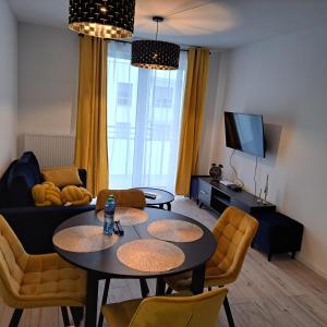 Televisyen dan/atau pusat hiburan di Apartament Grand +13 gambar