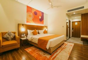En eller flere senge i et værelse på IRA by Orchid Sambhajinagar - Aurangabad