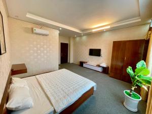 Ένα ή περισσότερα κρεβάτια σε δωμάτιο στο Cô Chung Hotel