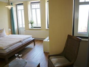 Postel nebo postele na pokoji v ubytování Hus Kiek in de See