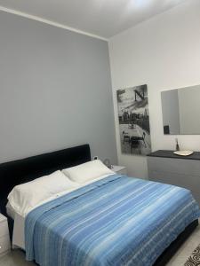 Letto o letti in una camera di Camere Andrea