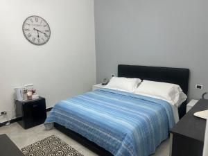 Letto o letti in una camera di Camere Andrea