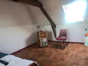 Postel nebo postele na pokoji v ubytování Chambres d'Hôtes - Ancienne Ecole St Joseph