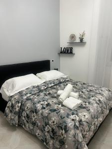 Letto o letti in una camera di Camere Andrea