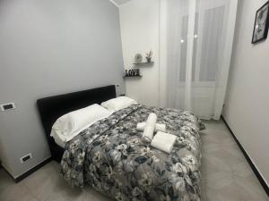 Letto o letti in una camera di Camere Andrea