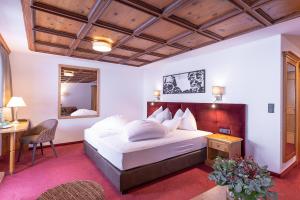 Postel nebo postele na pokoji v ubytování Hotel Sonnenheim