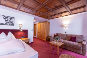 Postel nebo postele na pokoji v ubytování Hotel Sonnenheim