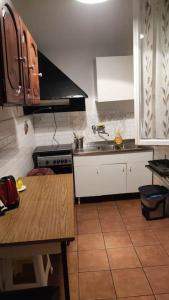 a kitchen with a sink and a counter top at Casa nel cuore di Firenze. in Florence