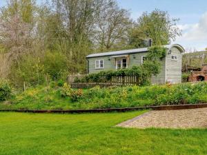 a house with a garden in front of it at 1 Bed in Ironbridge 82561 in Leighton