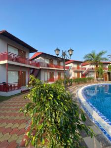 Bazén v ubytování DAN Resorts & Weddings nebo v jeho okolí