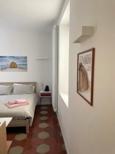 Voodi või voodid majutusasutuse Santa Vincenza - Suite Indipendente toas