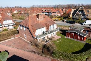 an aerial view of a large brick house at Gosewehr GbR in Hooksiel