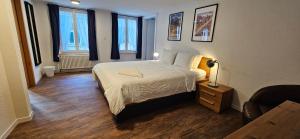 Voodi või voodid majutusasutuse The Aarburg Hotel & Café toas