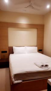 מיטה או מיטות בחדר ב-HOTEL SKYKING