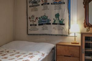 Letto o letti in una camera di Helloworld guesthouse