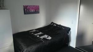 Postel nebo postele na pokoji v ubytování Bed & Kitchen Den Oever