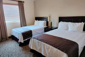 Säng eller sängar i ett rum på Wyndham Garden Torreon Tecnologico