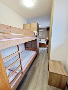 Krevet ili kreveti na kat u jedinici u objektu Hotel Rheintal