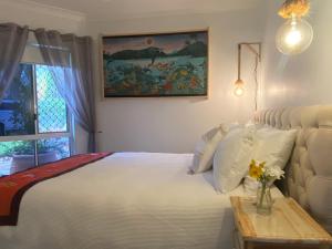 Postel nebo postele na pokoji v ubytování Coastal Escape
