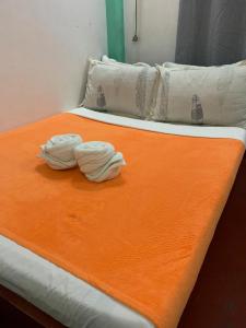 Postel nebo postele na pokoji v ubytování Dadods homestay