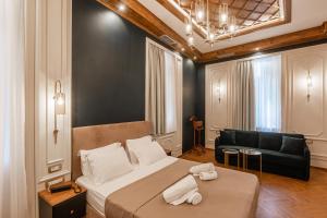 Ένα ή περισσότερα κρεβάτια σε δωμάτιο στο King Othon Boutique Hotel +95 φωτογραφίες
