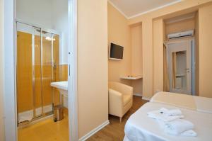 A bed or beds in a room at B&B Del Corso