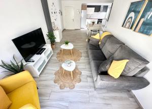 Posezení v ubytování Mango Sorbet súper central, 3 Desks, high speed internet, 3 bedrooms and 2 bathrooms