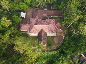 an aerial view of a house in the forest at Villa Milla Walauwa in Matale