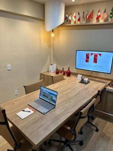 TV a/nebo společenská místnost v ubytování Grande Hotel Itaguaí