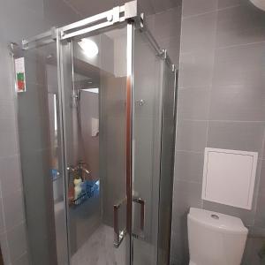 Koupelna v ubytování Апартамент В204 Belvedere Holiday Club