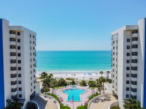 a view of the beach from the balcony of a resort at Ocean Sands 505 in St Pete Beach