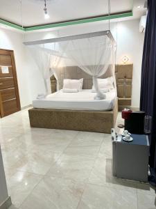 A bed or beds in a room at Zarafah