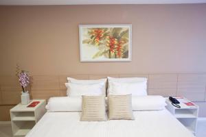 Postel nebo postele na pokoji v ubytování Grande Hotel Itaguaí