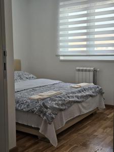 Ένα ή περισσότερα κρεβάτια σε δωμάτιο στο Dream Apartment