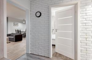 Posedenie v ubytovaní Winogrady Loft Apartment