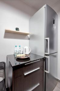 Kuchyňa alebo kuchynka v ubytovaní Winogrady Loft Apartment