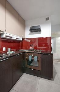 Kuchyňa alebo kuchynka v ubytovaní Winogrady Loft Apartment