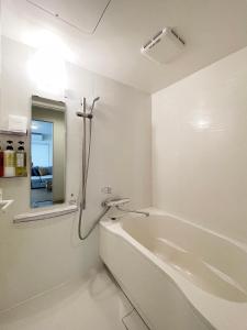 Bilik mandi di bHOTEL Kaniwasou 201 2BR Apt, Near Itsukushima Shrine, For 12 Ppl