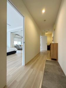 Katil atau katil-katil dalam bilik di bHOTEL Kaniwasou 201 2BR Apt, Near Itsukushima Shrine, For 12 Ppl