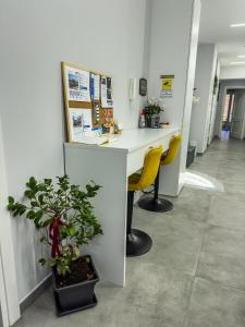 The lobby or reception area at Napoli Vitale
