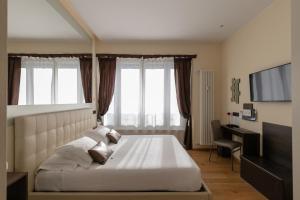 TV a/nebo společenská místnost v ubytování Aiello Rooms - San Babila