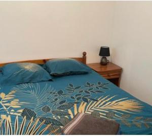 En eller flere senge i et værelse på Garaldia