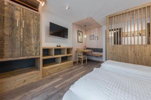 Postel nebo postele na pokoji v ubytování Appartamenti Residence Ada