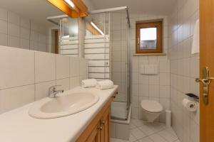 Koupelna v ubytování Appartement Berggasse by Schladming-Appartements