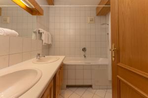Koupelna v ubytování Appartement Berggasse by Schladming-Appartements