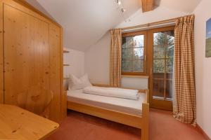 Postel nebo postele na pokoji v ubytování Appartement Berggasse by Schladming-Appartements
