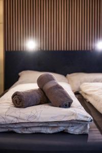 Letto o letti in una camera di BoRa Apartments