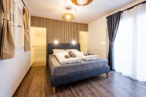 Letto o letti in una camera di BoRa Apartments